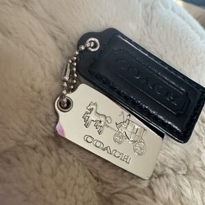Coach, leather and nickel wagon print key fob bag charm